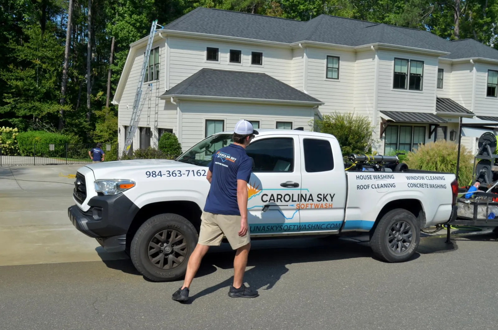 Carolina Sky truck and technician at a customer's home