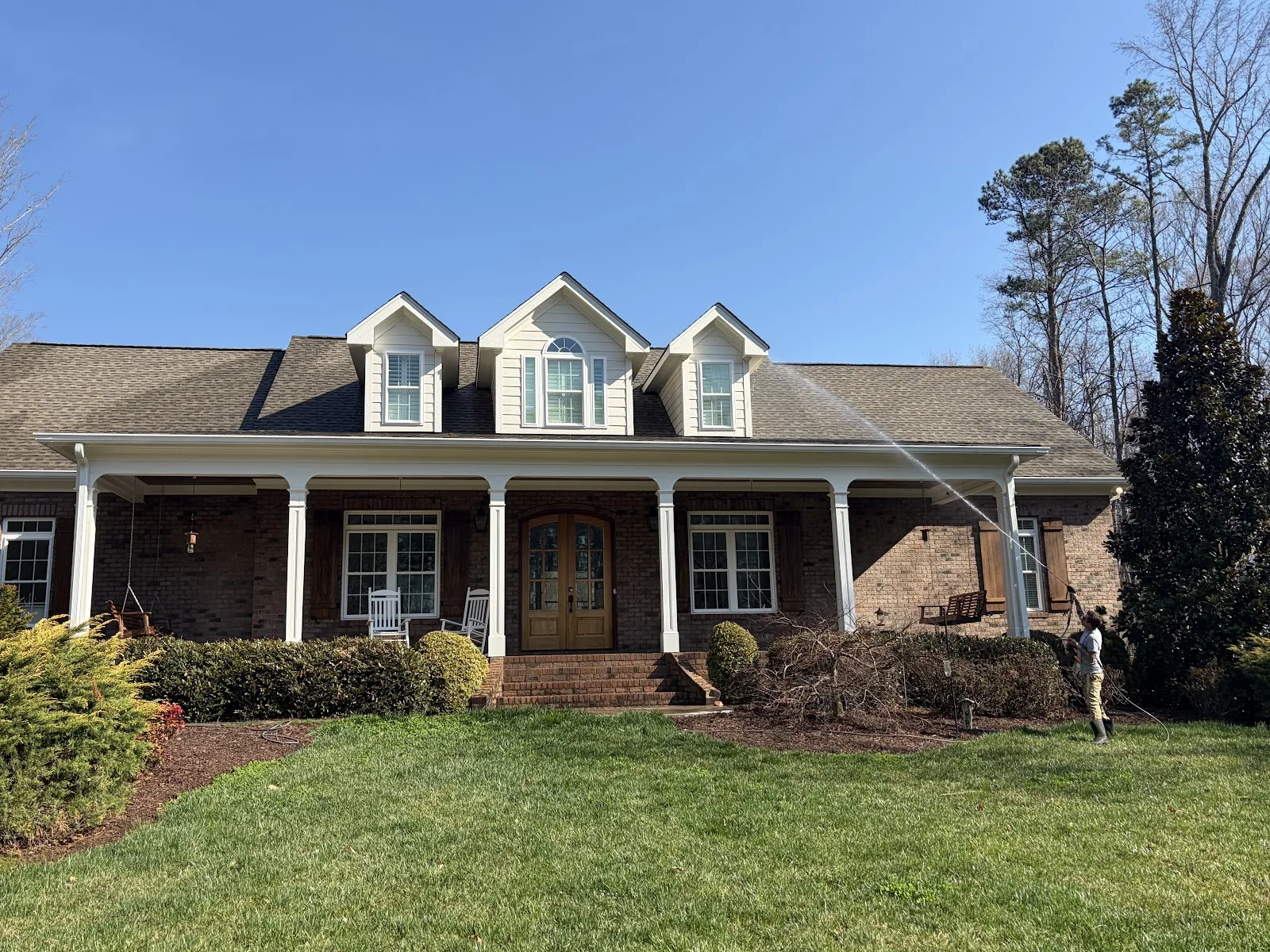 Freshly washed brick and siding home after house washing